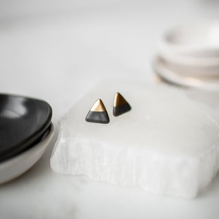 Gold Dipped Triangle Studs in Matte Black